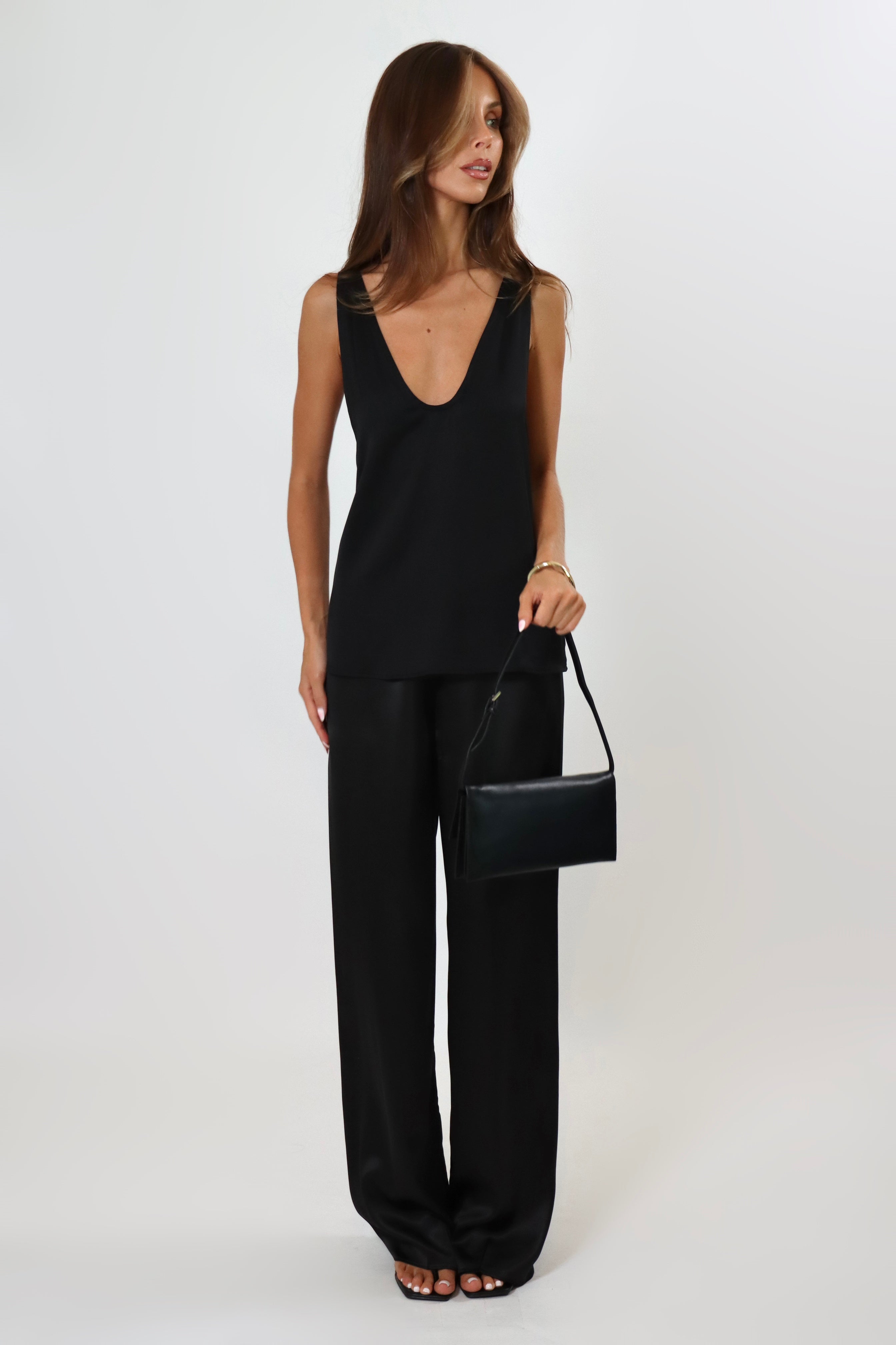 Black satin pants with soft drape and elastic waistband – April Seven