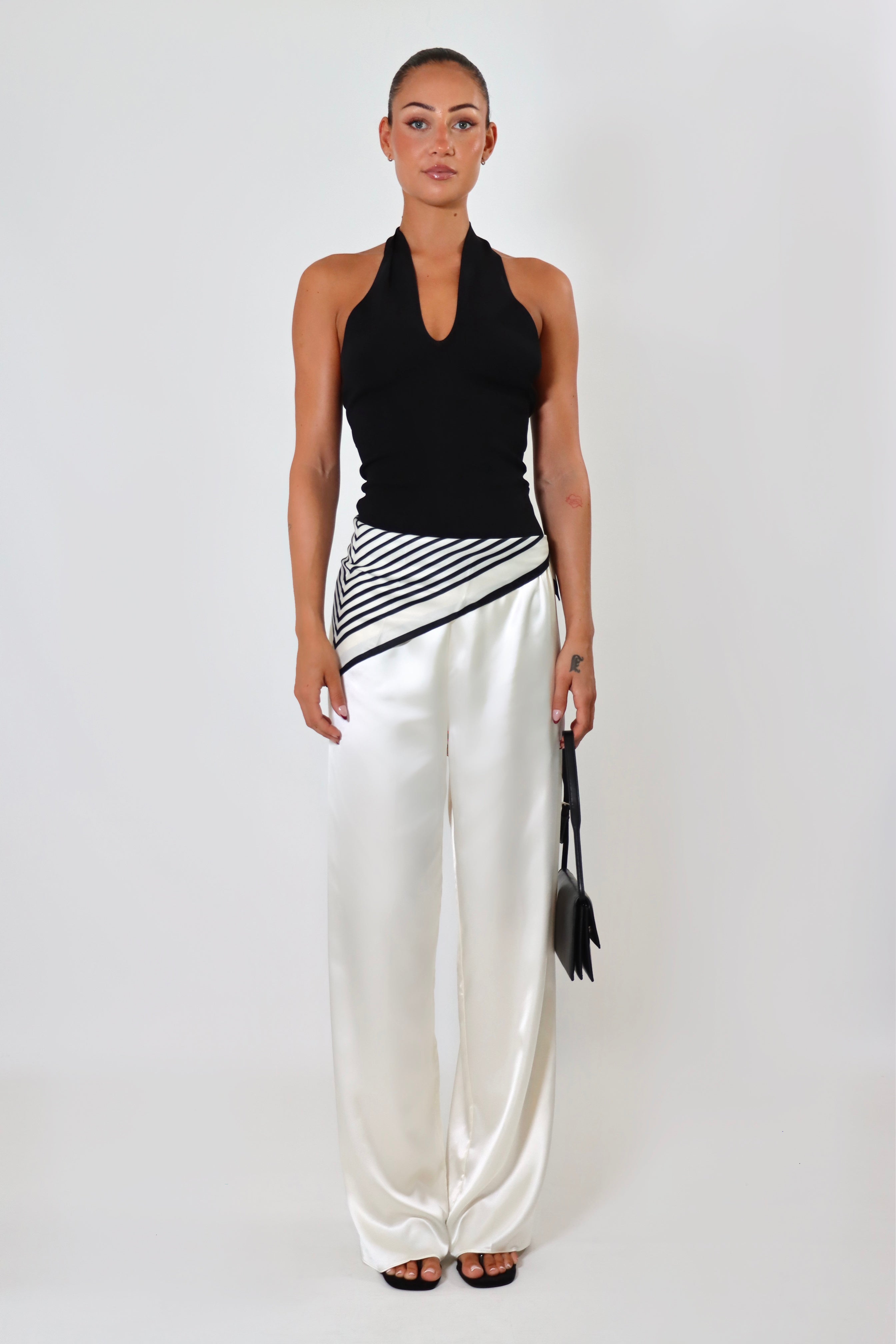April Satin Pant Tall in white – mid-rise fit with long inseam and soft drape.