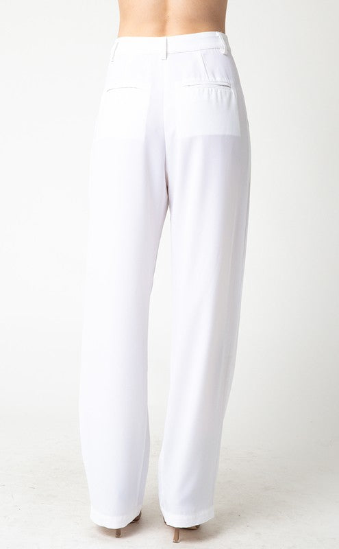 Back view of white Olivia pant by April Seven. High-waisted, straight leg with pockets.