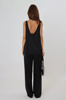 Black satin pants with soft drape and elastic waistband – April Seven