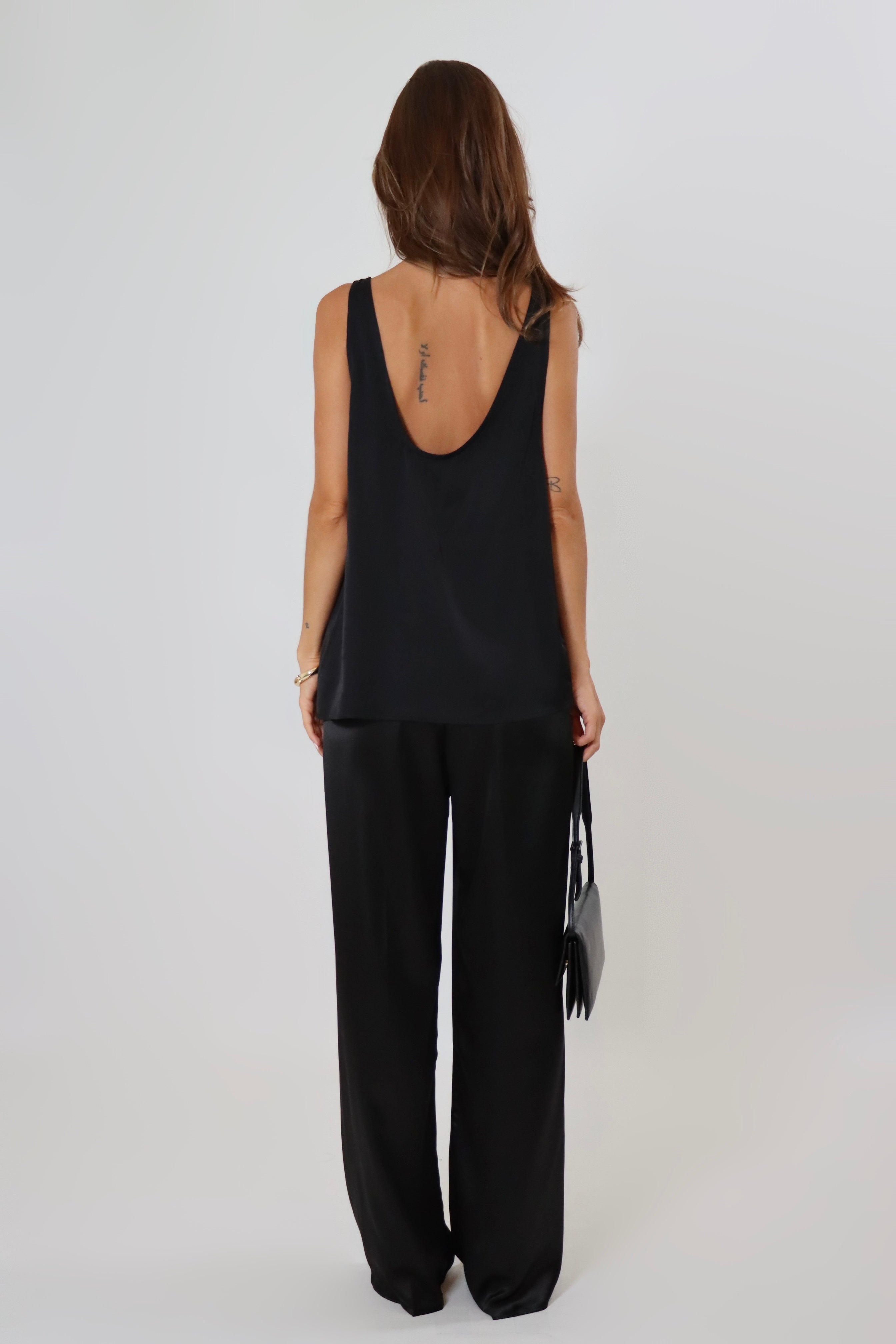 Black satin pants with soft drape and elastic waistband – April Seven