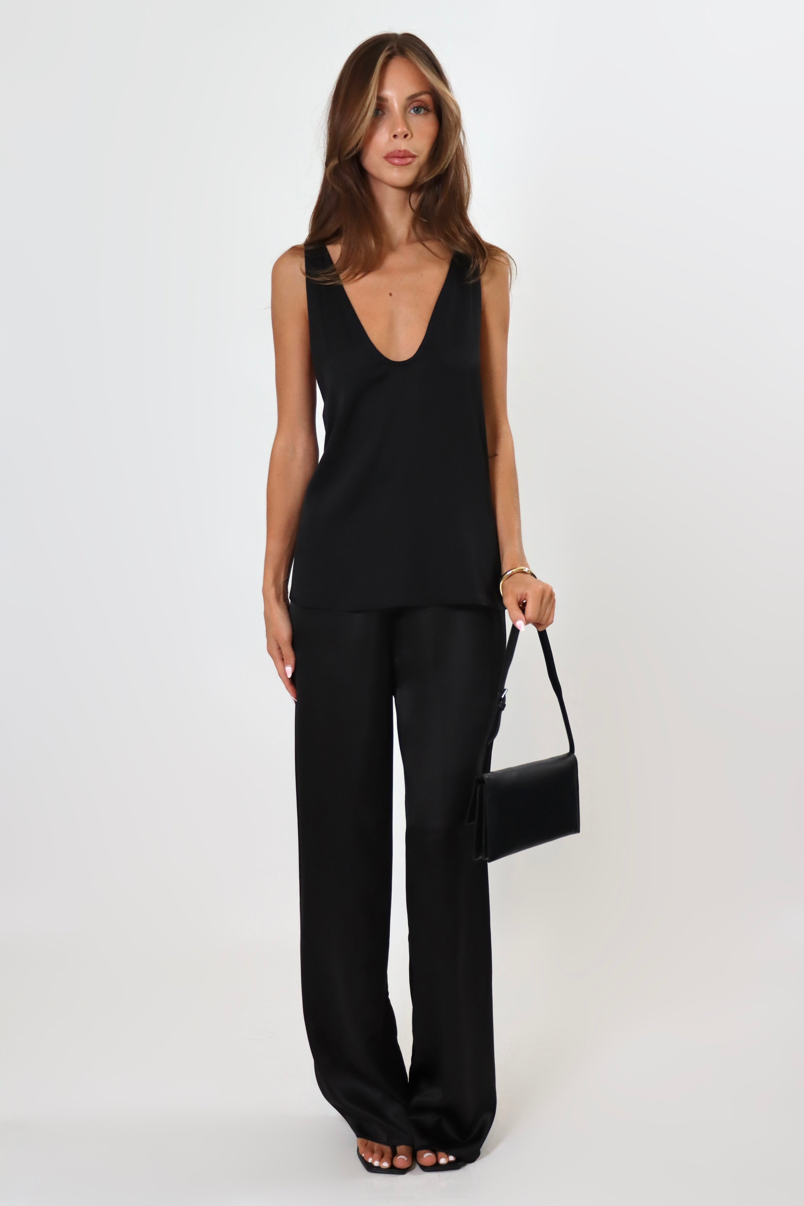 Black satin pants with soft drape and elastic waistband – April Seven
