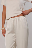 white satin pants with flowy drape and wide leg – April Seven