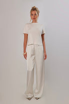 white satin pants with flowy drape and wide leg – April Seven