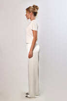 white satin pants with flowy drape and wide leg – April Seven